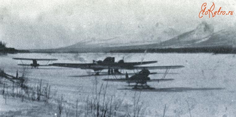 Авиация - Самолёты П-5 и АНТ-7 на одном из зимних аэродромов Северо-Востока. 1937