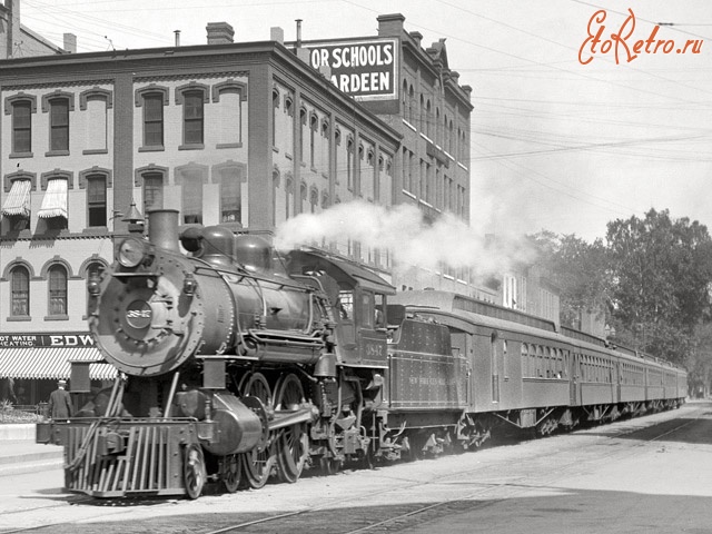 Железная дорога (поезда, паровозы, локомотивы, вагоны) - Экспресс на улице Сиракуз,штат Нью-Йорк,США