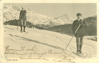Ретро открытки - Двое мужчин на лыжах на фоне горного пейзажа