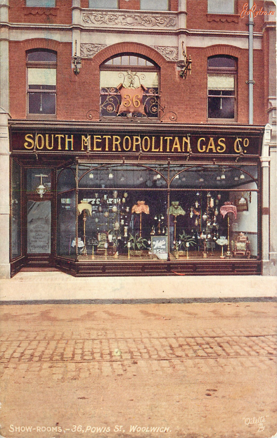 Старые магазины, рестораны и другие учреждения - Фасад Метрополитен газ Ко на улице Повис в Лондоне