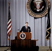Остальной мир - President John F. Kennedy at the podium