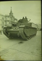 Киев - Тяжёлый танк Т-35 проезжают мимо здания бывшей городской Думы, 7 ноября 1938 года.