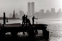 Нью-Йорк - Early-morning fishermen on the Caven Point Pier off Port Libert? in Jersey City tried their luck in the harbor in 1993. США,  Нью-Джерси
