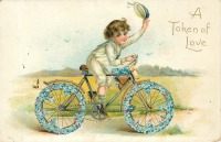 Ретро открытки - Знак любви. Мальчик на велосипеде с голубыми незабудками