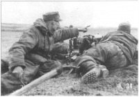 Войны (боевые действия) - Расчет немецкого пулемета MG-08.